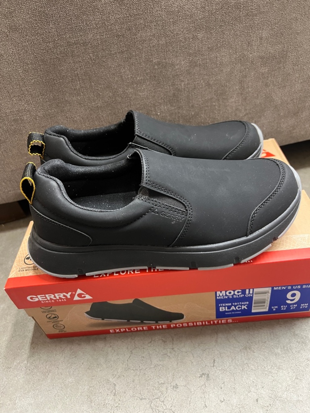 Gerry Weber Black Slip-On Loafers with Yellow Heel Tabs